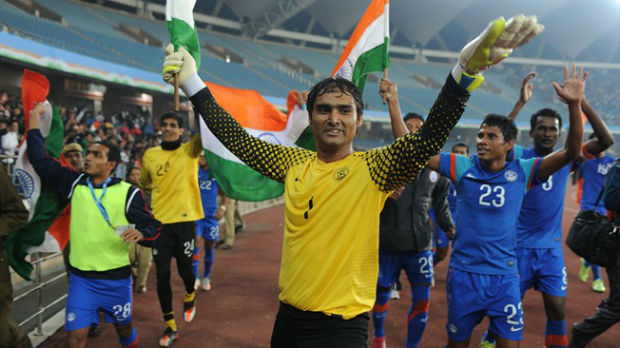 Indian football players celebrating